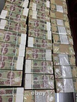 20 notes x 50,000 VND + 20 notes x 100,000 VND UNC = 3 Million Vietnam Currency