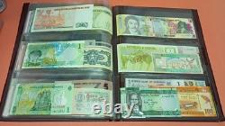 Catalogue de devises pour parents et grands-parents 78 billets UNC provenant de 78 pays différents Catalogue de devises pour parents et grands-parents 78 billets UNC provenant de 78 pays différents