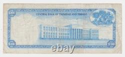 Trinité-et-Tobago 100 dollars $ 1964 P35a VF Arbres de coco Note de monnaie date clé